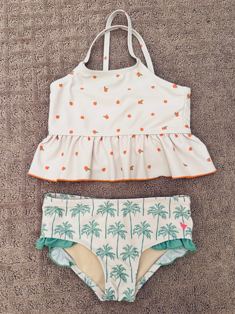 Pink Chicken Two-Piece Swim Set with Oranges Ruffle Top and Palm Print Bottom